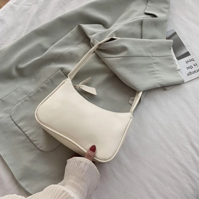 Retro Unterarmtasche Damen Schleife Handtasche PU Leder Baguette Tasche Umhängetasche im westlichen Stil Achselfeuchtigkeit