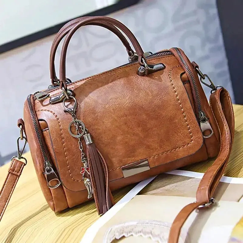 Quasten-Dekor-Damen-Umhängetasche mit großer Kapazität, modische Umhängetasche mit Reißverschluss und abnehmbarem Riemen, Boston-Handtasche